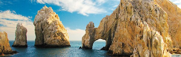  Giant rocks                                                        in the water at                                                        Cabo San Lucas,                                                        Mexico.